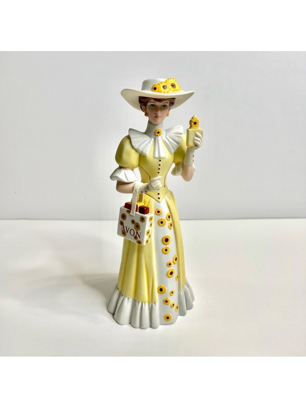 Avon 2012 Mrs Albee Presidents Club Award Porcelain Sunflower Lady Figurine